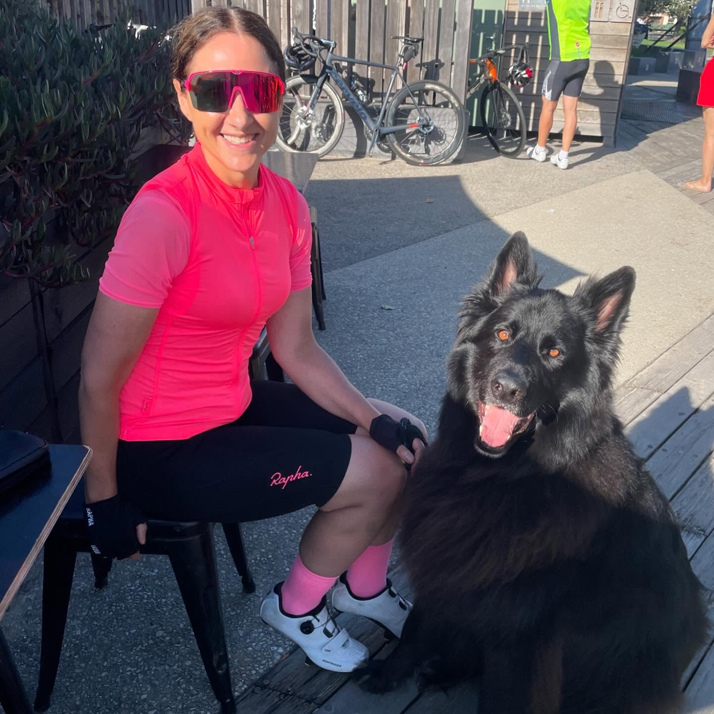 Rose Sutera in cycling kit with her dog after a ride